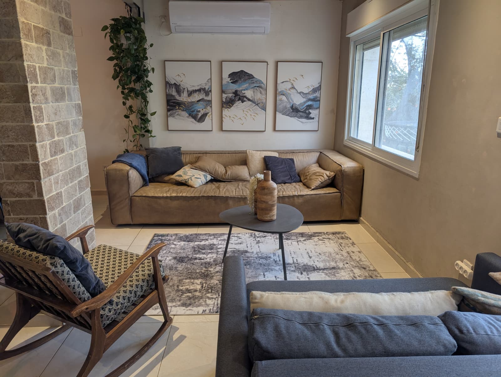 Living room with sofas and warm decor
